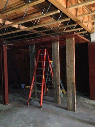 Using a ladder for vault installation